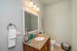 The second bedroom shares a bathroom with the third bedroom and has a tub/shower combo